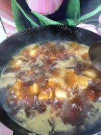 鲜美可口的红烧肉炖土豆做法图解6)