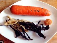 美味的胡萝卜猪骨菜干汤做法图解3)