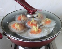 美味的蒜蓉粉丝蒸扇贝做法图解12)