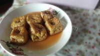 美味的糖醋油豆腐塞肉做法图解7)