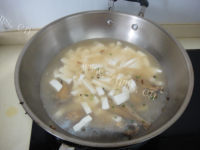 雪菜豆腐黄鱼汤做法图解9)