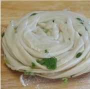 独特的脆脆葱油盘丝饼做法图解4)