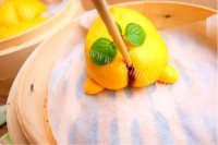 美味的懒蛋蛋屁股流沙包做法图解14)