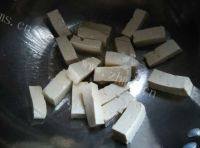 美味的丸子烩豆腐做法图解6)