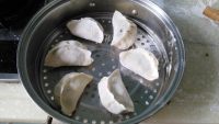 美味的韭菜鸡蛋烫面饺做法图解13)