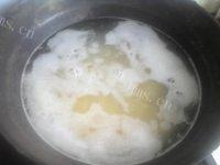 美美厨房之小米粥做法图解6)