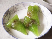 美味的绿西米蜜枣粽做法图解14)
