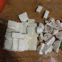 色香味浓的蟹黄豆腐做法图解6)