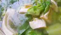 鲜美菜苔豆腐汤做法图解8)