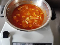 自制泡菜年糕豆腐汤做法图解6)