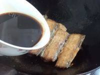 铁锅炖鱼贴饼子做法图解8)