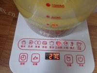 色香味浓的苹果小米粥做法图解6)