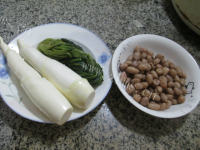 雪菜花生米炒茭白做法图解1)