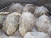 美味的萝卜樱大包子做法图解13)