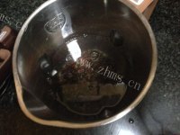 自制营养黑米粥做法图解5)