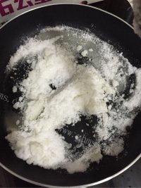 自制花生芝麻糖做法图解3)