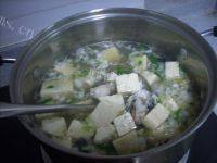 鲜美海蛎子豆腐汤做法图解5)