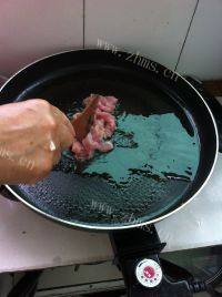 诱人的猪肉炒豆角做法图解4)