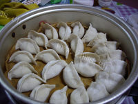 自制猪肉白菜蒸饺做法图解10)