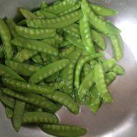 肉片炒荷兰豆做法图解5)
