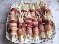 家常菜五花肉金针菇卷做法图解4)