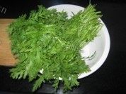 色泽不错的茼蒿炖豆腐做法图解2)