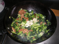 家常菊花菜炒豆制品做法图解12)