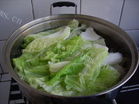 自制猪肉白菜蒸饺做法图解3)