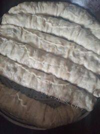 美味的蒸菜卷子做法图解6)