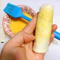 美味乳酪肉松卷做法图解10)