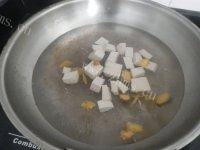 营养丰富的花蛤豆腐汤做法图解5)