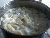 酸菜猪肉饺子自制做法图解18)