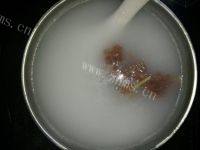 自制皮蛋瘦肉粥做法图解6)