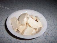 可口的酸菜炖排骨做法图解3)