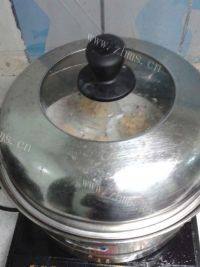 美味的蒜蓉粉丝蒸扇贝做法图解9)