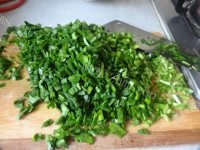 美味的韭菜鲜肉锅贴做法图解4)