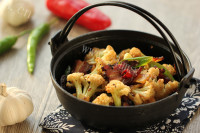 美味可口的豆豉腊肉煸花菜做法图解9)