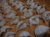 自制猪肉白菜水饺做法图解12)
