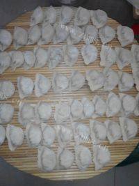 自己做的猪肉萝卜水饺做法图解9)