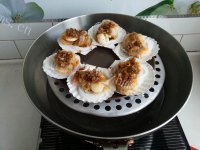 美味的剁椒蒜蓉蒸扇贝做法图解8)