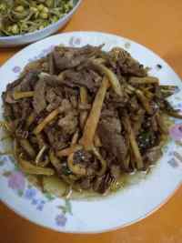 香喷喷的茭白炒肉丝做法图解7)