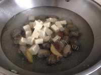 美味的花蛤豆腐汤做法图解3)