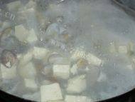 其味无穷的花蛤豆腐汤做法图解6)