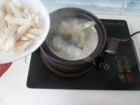 鲜美鱼头炖山药做法图解9)