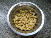 香味浓郁的青菜黄豆排骨大米粥做法图解2)