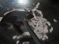 口感好的茭白炒肉丝做法图解4)