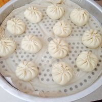 美味的萝卜脂渣大包子做法图解12)
