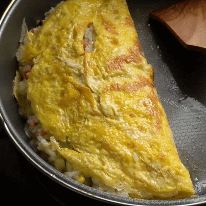 美味的蛋包饭做法图解14)