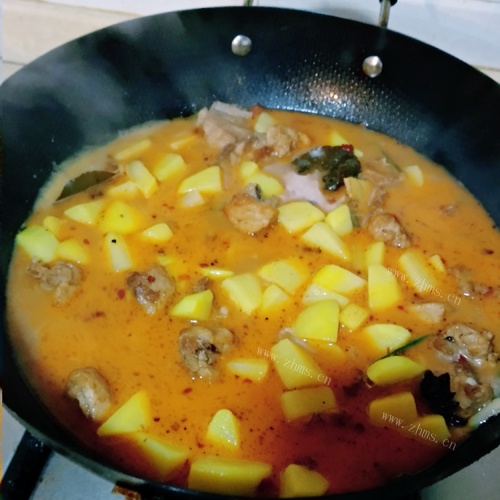 土豆烧排骨做法图解9)