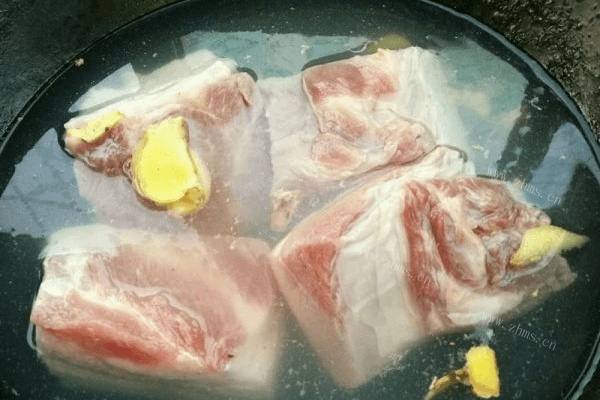 梅干菜扣肉做法图解4)
